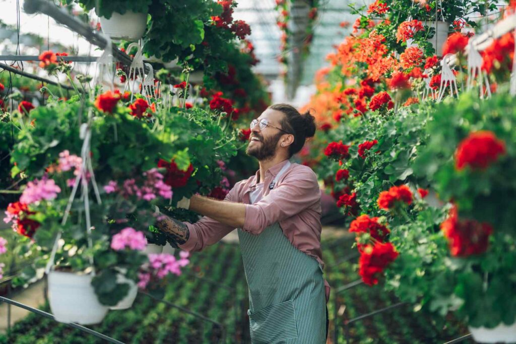 man-gardener-working-in-a-greenhouse-2025-04-01-22-02-29-utc